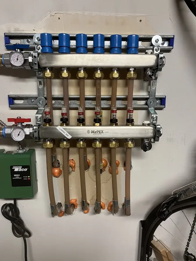 Plumber performing Water Heater Repair at a residential property in Stapleton